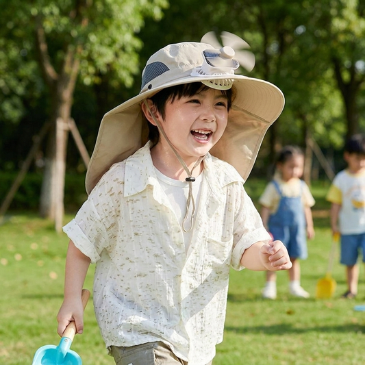 Child wearing colorful solar fan sun hat playing outdoors on a sunny day